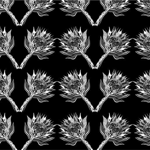 A black and white seamless fabric pattern featuring stylized white thistle or protea-like flowers arranged in repeating V-shaped pairs on a solid black background.