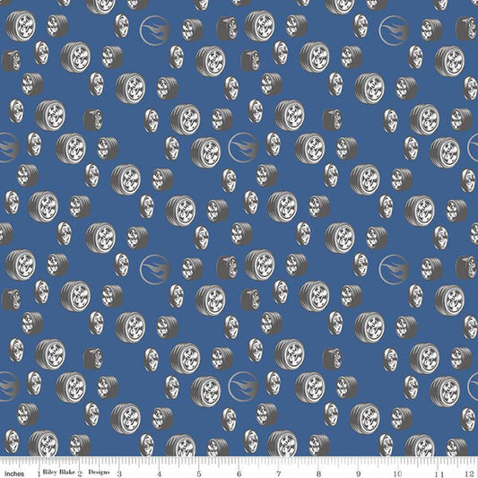 A repeating pattern of silver and white stylized wheels and tyres with hot wheels logoson a medium blue background, with a small ruler scale along the bottom edge.