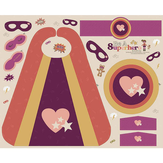 Afabric panel of a children's superhero-themed party decoration kit on a light beige background. It includes a large cape template with a pink heart and star design, matching purple and gold masks, a circular target, and several smaller matching paper cutouts and stickers.