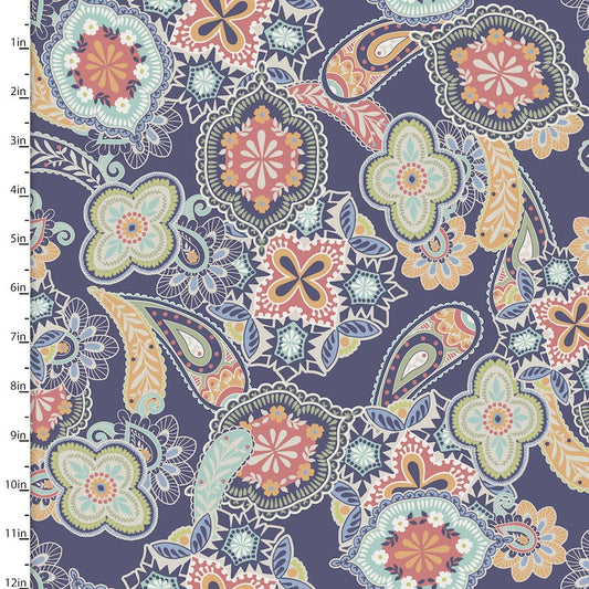 A close-up of a fabric pattern swatch featuring a detailed paisley and floral design in muted tones of navy, coral, beige, and light blue