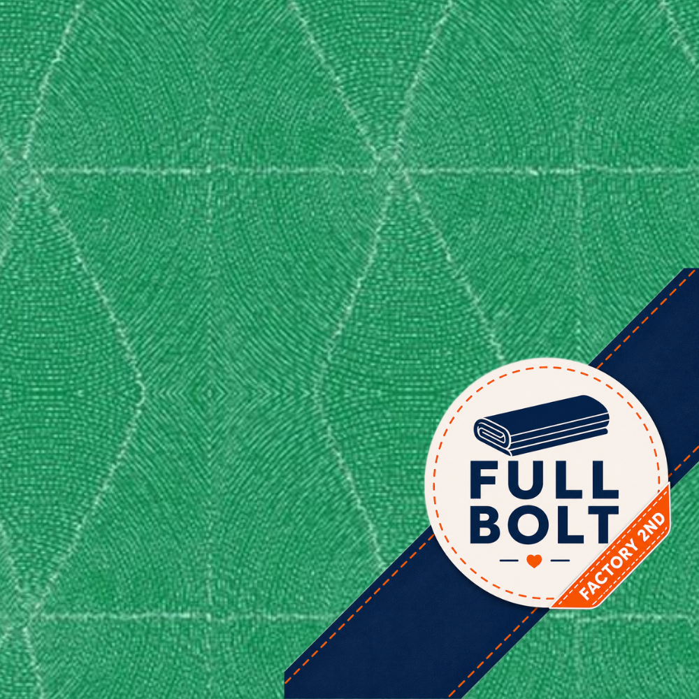 A close-up of a green textured fabric with a subtle geometric pattern, featuring a navy blue diagonal ribbon with red stitching and a circular white sticker that reads 'FULL BOLT' and 'FACTORY 2ND'.