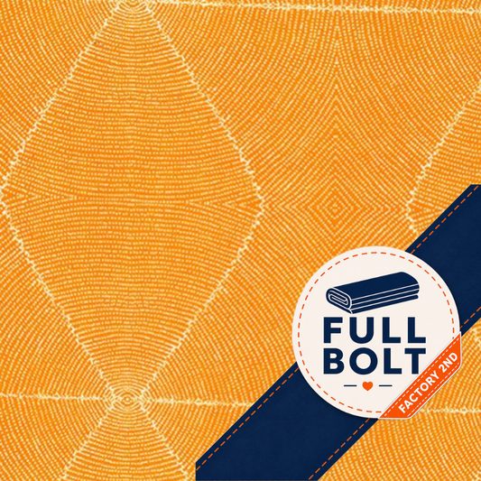 A close-up of a fabric with a warm orange-yellow background, fine linear texture, and a dark navy diagonal band across the lower right. A circular badge on the band reads "FULL BOLT" with a small orange "FACTORY 2ND" tag.