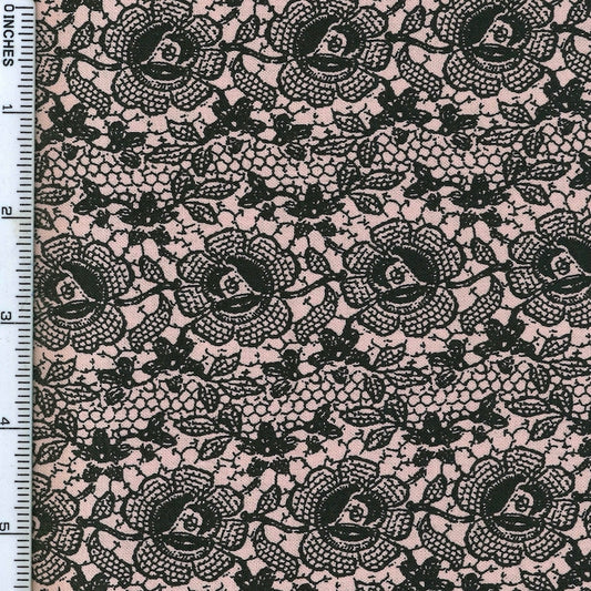 A delicate dusty pink lace-inspired print from the Lady Claire collection by Blank Quilting, bringing a soft and elegant look to quilting and sewing projects