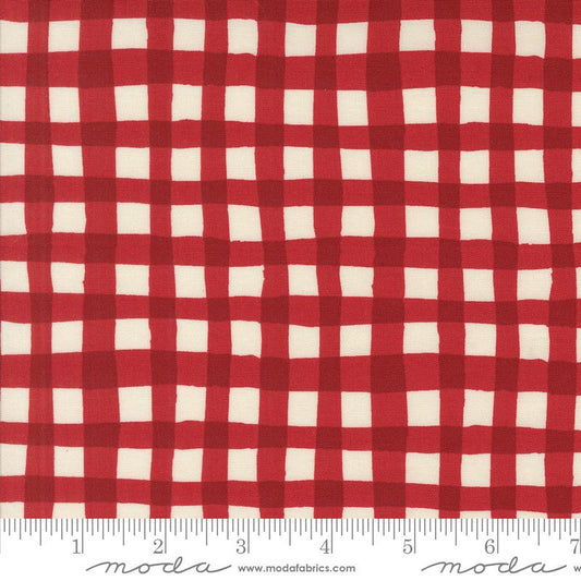 Red and off-white gingham checkered fabric shown flat, with a ruler along the bottom edge for scale. The Modas Fabrics watermark is visible at the bottom.