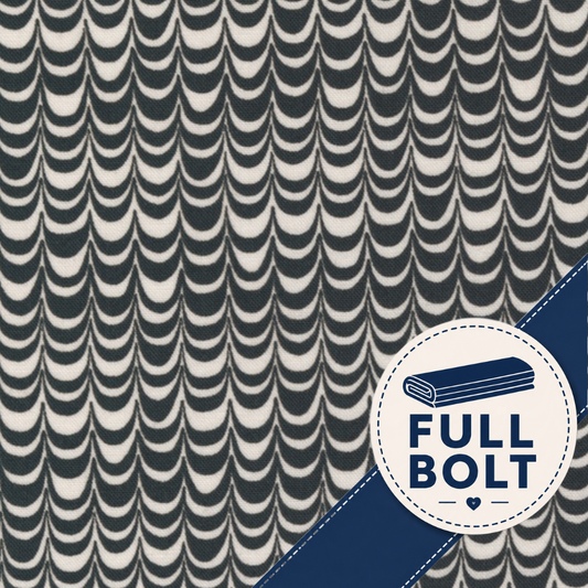 A close-up of a fabric pattern with repeating scalloped arches in dark navy and off-white, plus a blue diagonal band and a circular badge reading FULL BOLT.