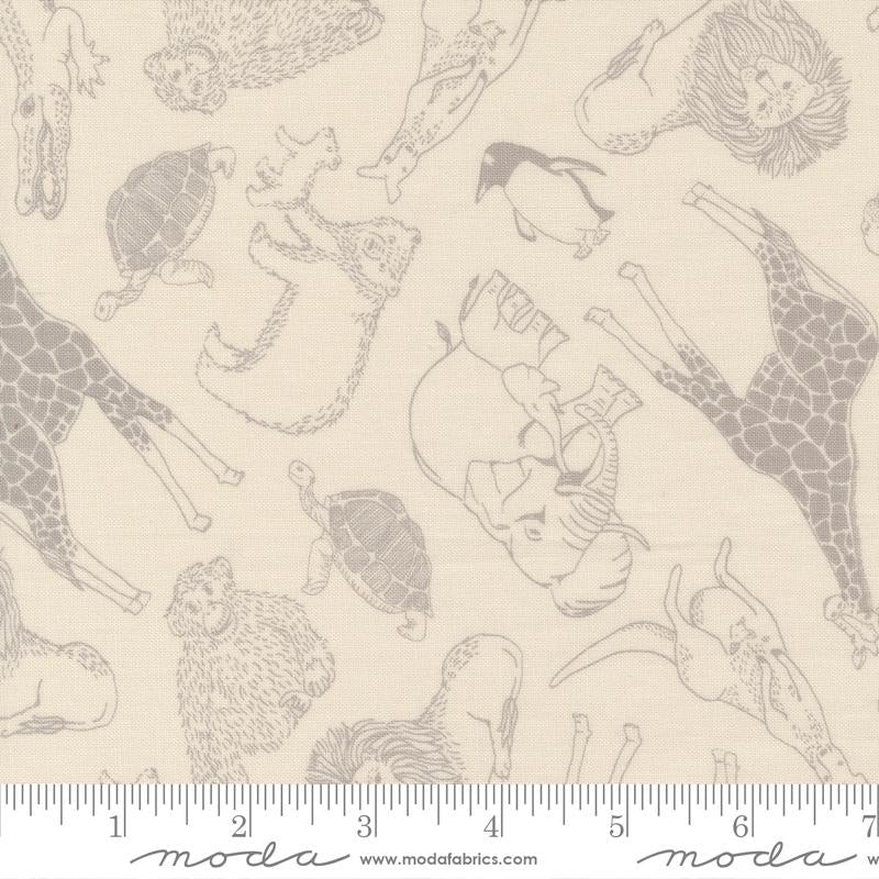 Pattern of various animals on a beige background with a ruler for scale.