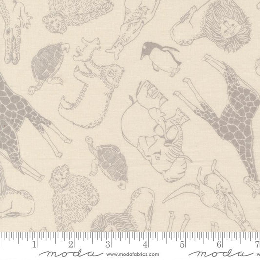 Pattern of various animals on a beige background with a ruler for scale.