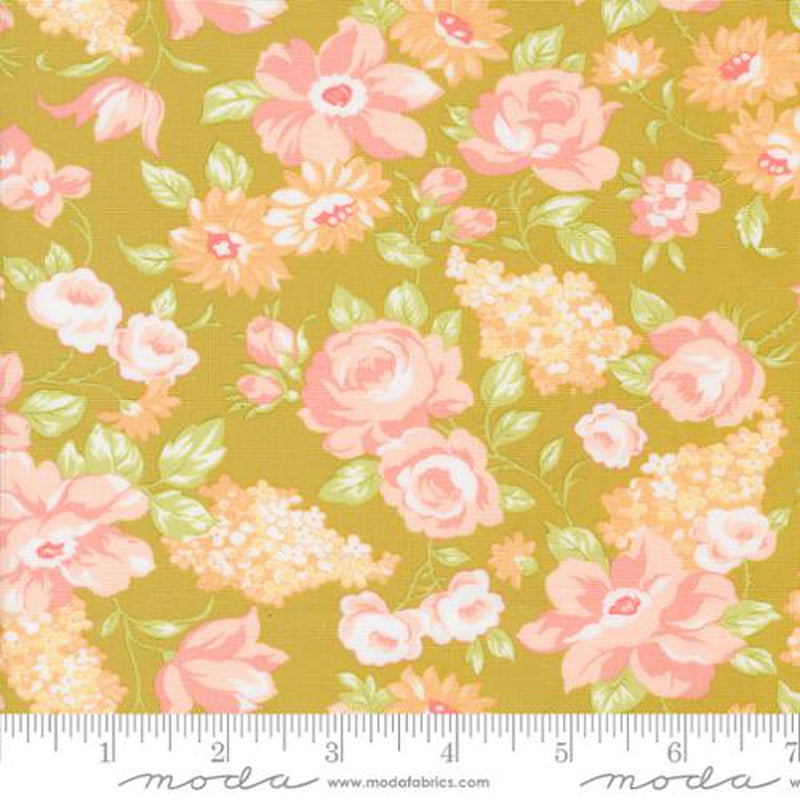 Floral fabric pattern with pink and peach roses, yellow flowers, and green leaves on a mustard yellow background, shown with a ruler at the bottom indicating scale. The brand Modafabrics is visible in the watermark.