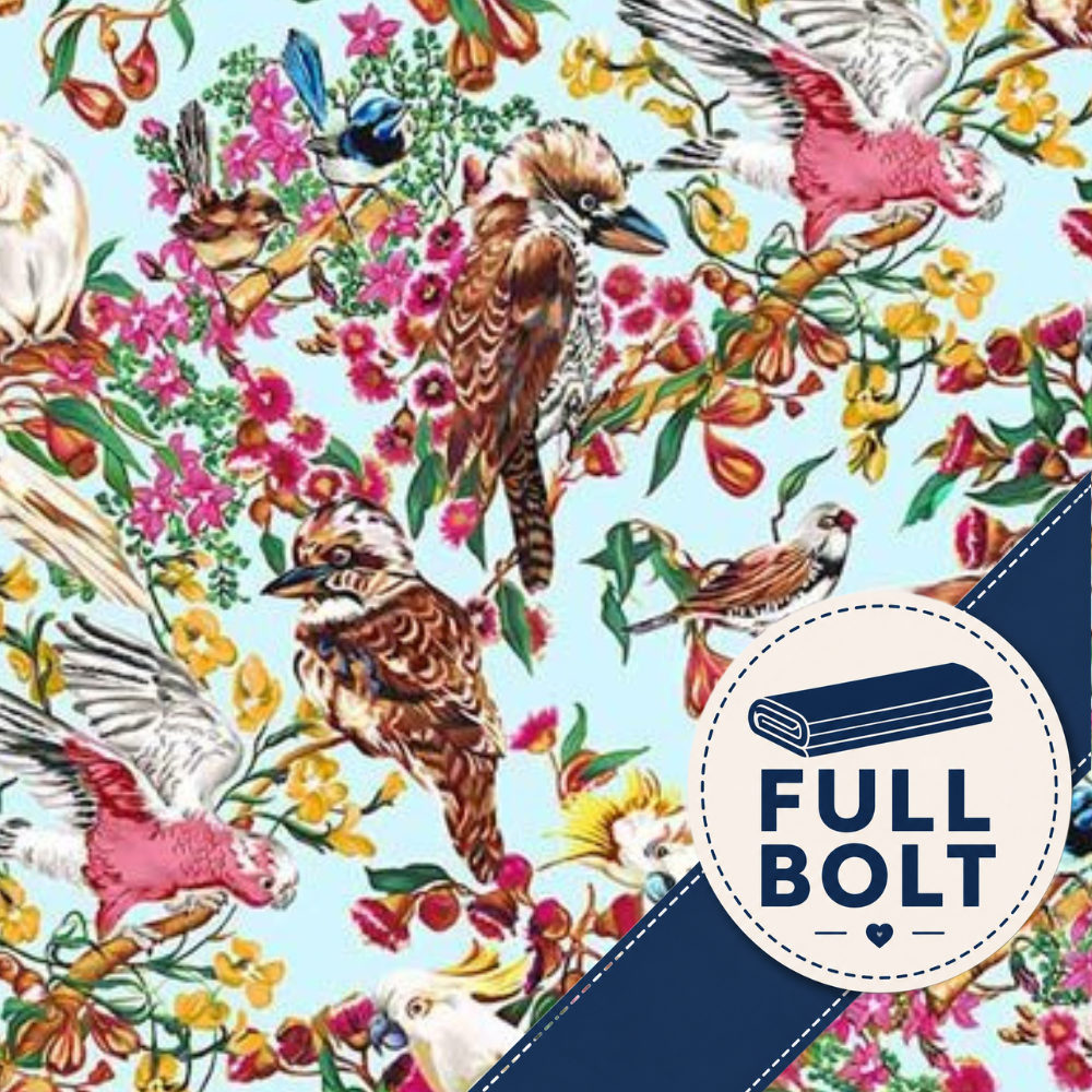A colorful bird-and-floral full-bolt fabric pattern on a light blue background, with a white circular badge reading FULL BOLT and a dark navy diagonal stripe across the lower right.