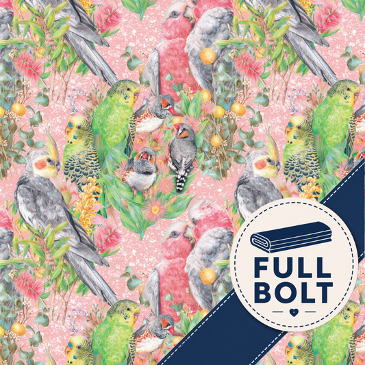 A repeating fabric pattern featuring colorful Australian birds, flowers, and leaves on a light pink background, with a dark navy diagonal band and a circular badge reading FULL BOLT.