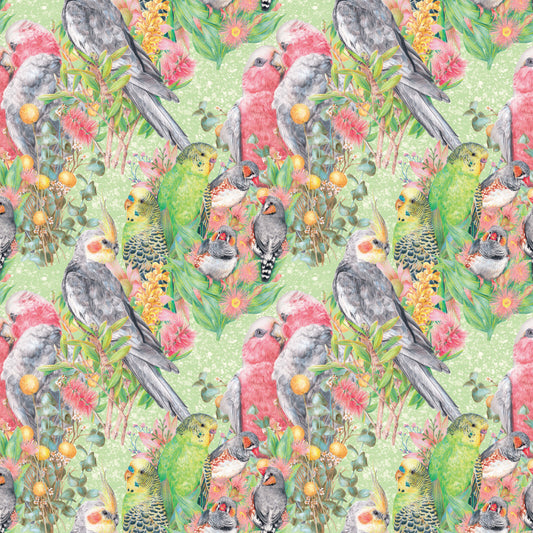 A repeating fabric pattern featuring tropical birds, including green parrots, gray cockatoos, and pink-and-white lovebirds, surrounded by pink flowers and yellow-orange berries on a light green background.