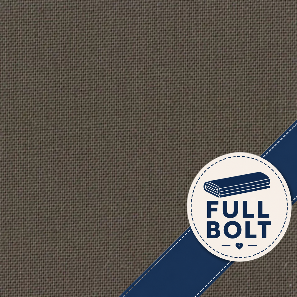 Close-up of a dark brown woven fabric texture with a blue diagonal ribbon and a circular badge reading “FULL BOLT” in the lower right corner.
