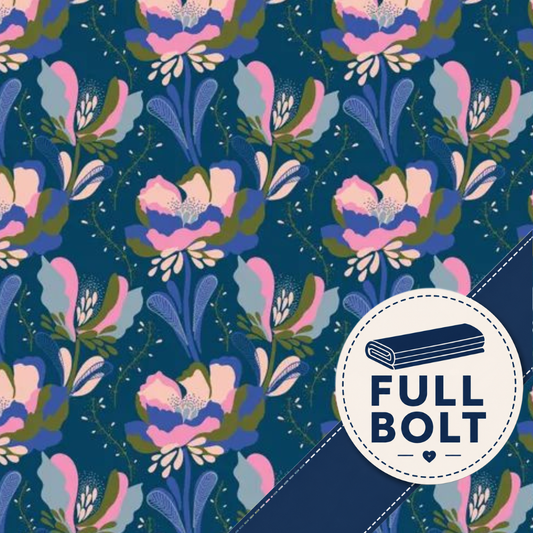 A close-up of a fabric material featuring a repeating floral pattern on a dark blue background, with pink, lavender, and olive motifs. A white circular badge in the lower right says “FULL BOLT” with a bolt icon.
