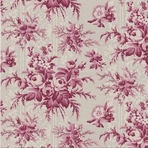 A repeating floral toile fabric pattern in dusty pink and mauve on a warm beige background, with roses, leaves, and delicate botanical motifs filling the frame.