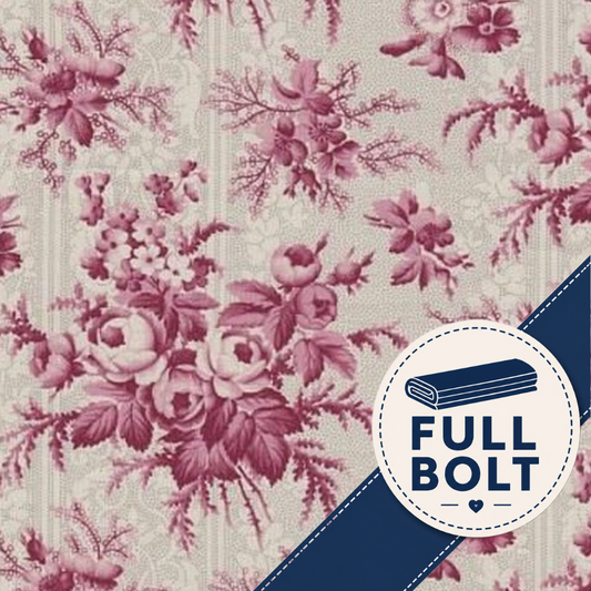 A close-up of a floral fabric pattern with pink and mauve flowers on a warm beige background, overlaid with a dark blue diagonal stripe and a circular badge that reads 'FULL BOLT'.