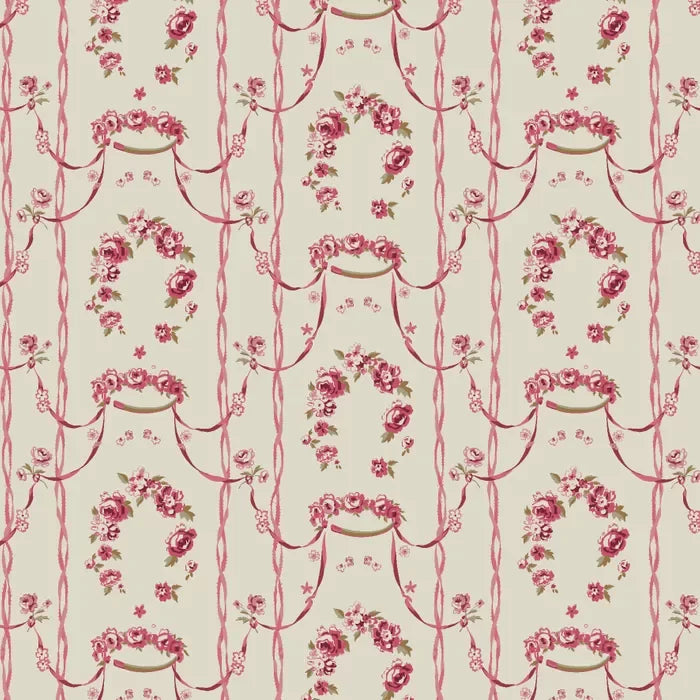 A repeating floral fabric pattern with pink rose garlands, small stars, and vertical ribbon-like lines on a warm cream background.
