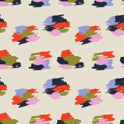 A repeating abstract fabric pattern of multicolored paint strokes on a warm beige background. The brushstroke motifs include navy, pink, red-orange, lavender, olive green, and mustard yellow.