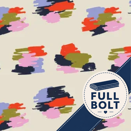A close-up of fabric showing a repeating abstract brushstroke pattern in coral, pink, lavender, olive, and navy on a warm cream background, with a circular badge reading FULL BOLT and a navy diagonal banner in the lower right.
