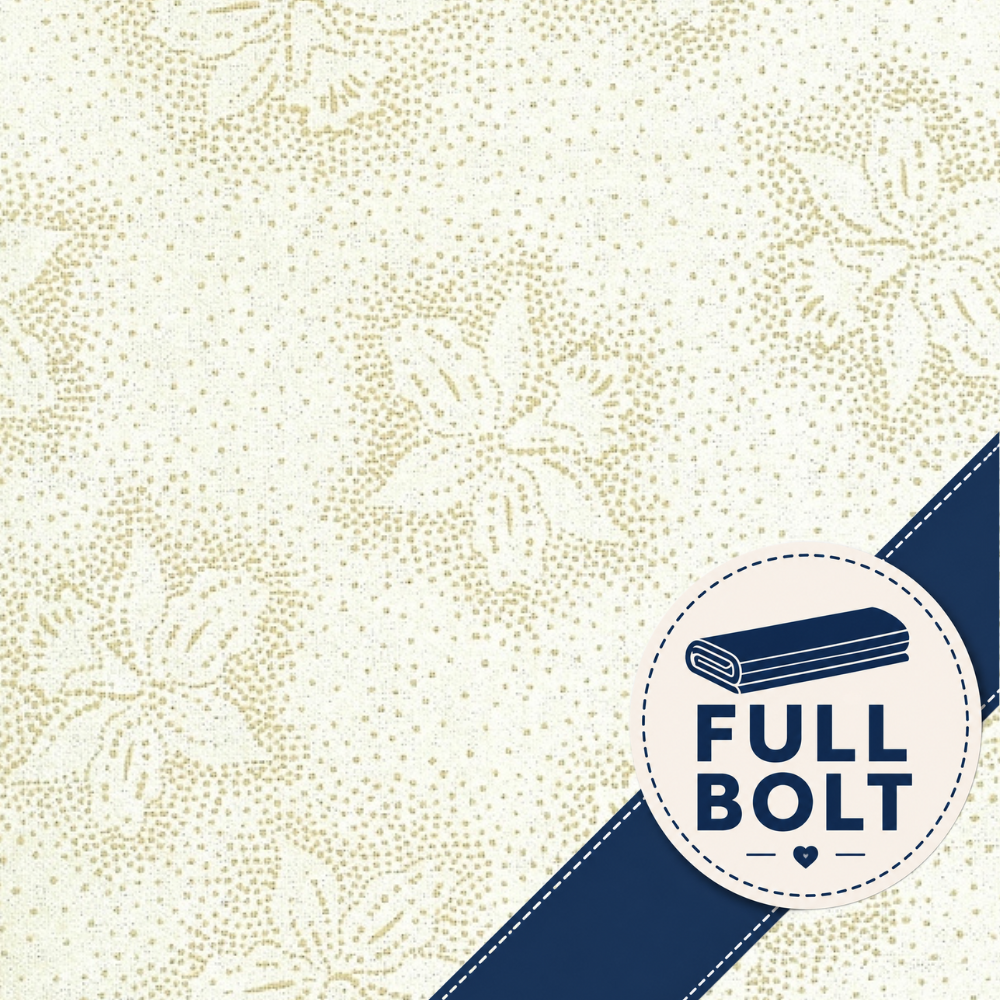 A close-up of a fabric sample with a cream background, fine gold speckled dot pattern, and large tonal floral motifs. A navy diagonal ribbon crosses the lower right corner, and a circular badge reads “FULL BOLT” with an icon of folded fabric.