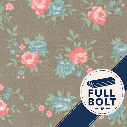 Floral fabric pattern with pink and blue roses on a taupe background, overlaid with a navy diagonal stripe and a circular 'FULL BOLT' badge.