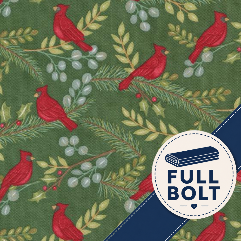 A close-up of fabric with a repeating pattern of red cardinal birds, green pine branches, and white berries on an olive green background, plus a blue diagonal banner and a white circular badge reading FULL BOLT.