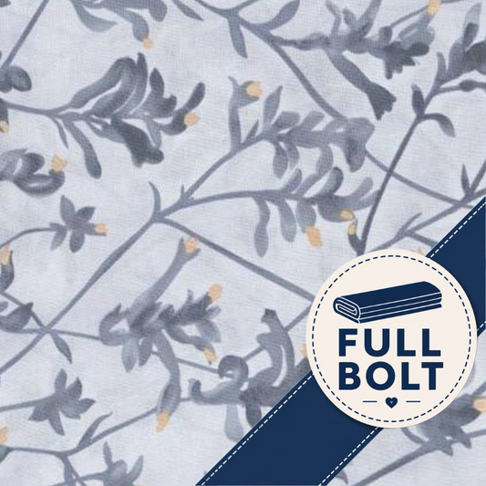 A close-up of fabric showing a delicate floral branch pattern in muted blue-gray and navy on a pale gray background, with a dark navy diagonal band and a circular badge reading FULL BOLT.