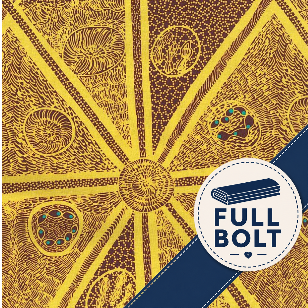 A close-up of a printed fabric pattern with radiating yellow and brown geometric sections, circular motifs, and a dark blue diagonal banner containing the text 'FULL BOLT' with a bolt icon.