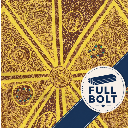 A close-up of a printed fabric pattern with radiating yellow and brown geometric sections, circular motifs, and a dark blue diagonal banner containing the text 'FULL BOLT' with a bolt icon.