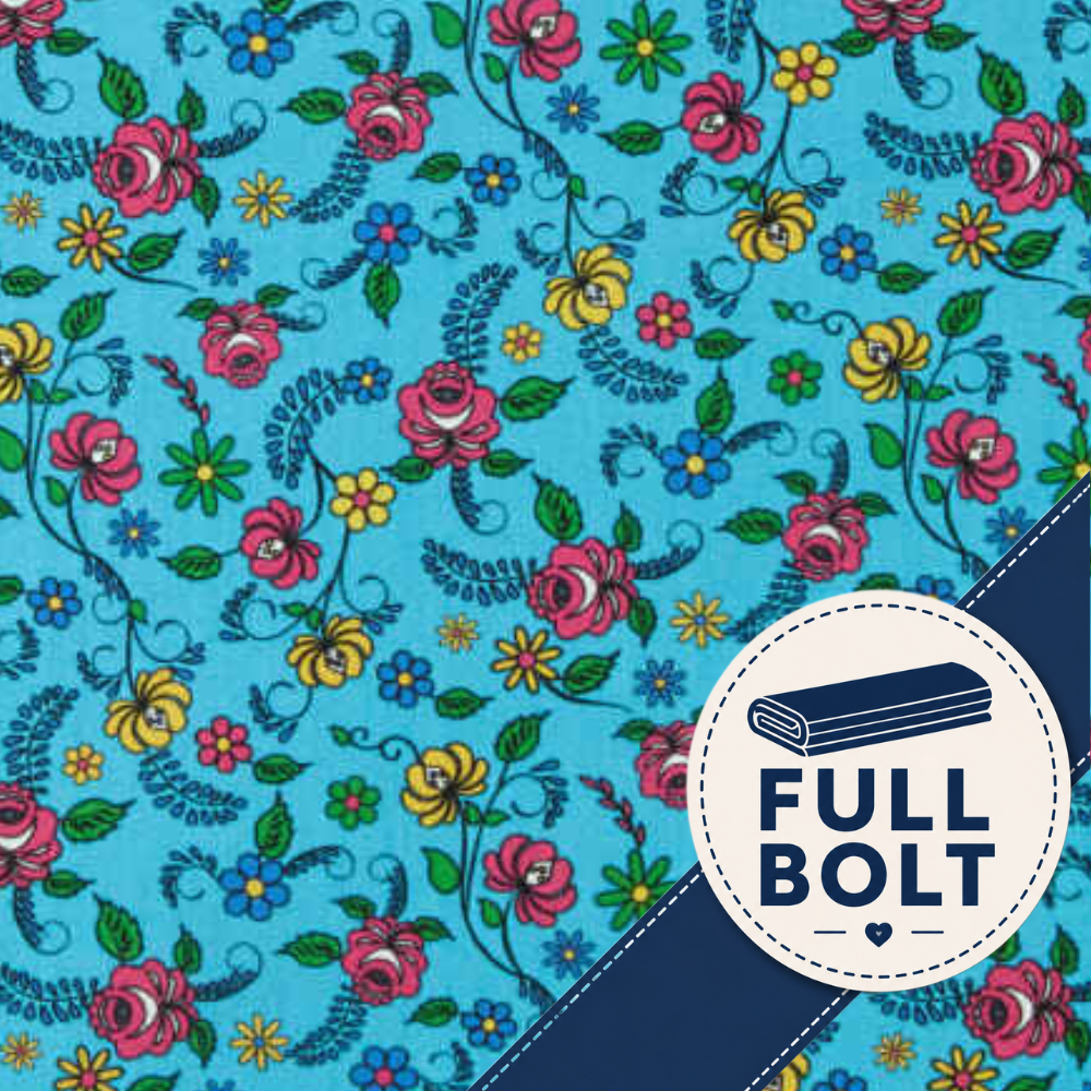 A close-up of a fabric pattern featuring a vibrant turquoise blue background with a repeating floral print of pink, yellow, and blue flowers with green leaves. A dark navy blue diagonal stripe runs from the bottom right corner, and a circular white badge in the lower right reads 'FULL BOLT' with a stitched bolt icon.