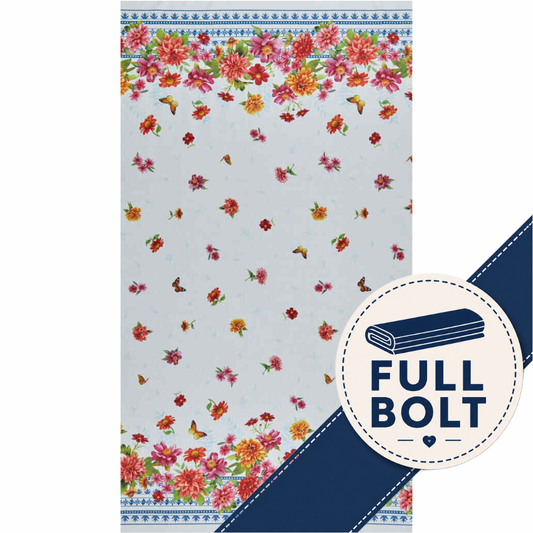 A fabric textile product shown on a white background with a floral print. The fabric has a light  base with pink, red, orange, and yellow flowers, green leaves, and butterfly motifs, plus blue decorative borders at the top and bottom.