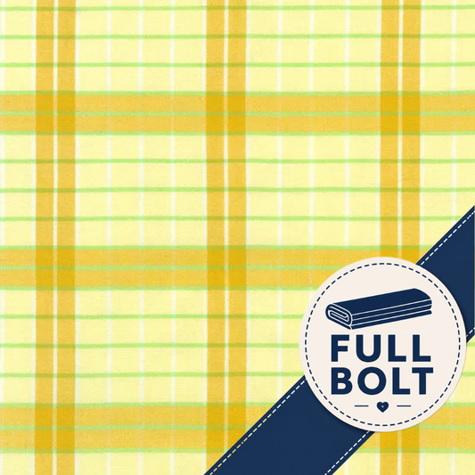 Yellow and green plaid fabric pattern with a navy blue diagonal ribbon overlay and a circular badge reading 'FULL BOLT'.