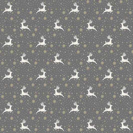 A repeating pattern of white leaping reindeer on a dark gray background with small white stars and muted gold snowflakes.