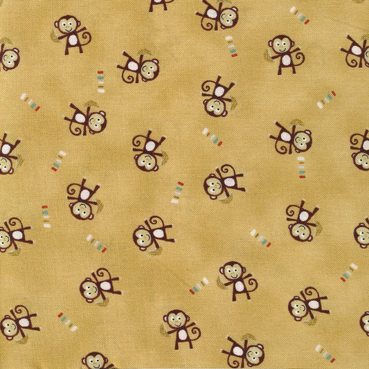 A repeating pattern of cartoon monkeys in dark brown and cream, scattered across a warm tan background with small colorful striped accents.
