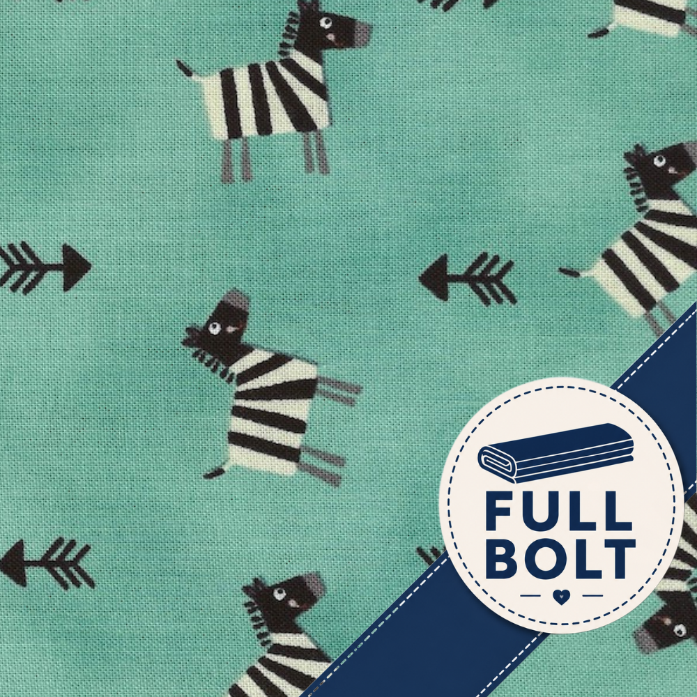 A close-up of fabric showing a repeating pattern of zebra animals and black arrows on an aqua green background, with a blue diagonal band and a circular badge reading “FULL BOLT.”.