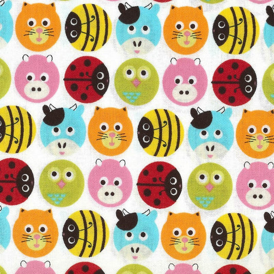 A close-up of a white fabric with a colorful repeating pattern of cartoon animal faces, including orange cats, yellow and black striped bees, light blue cats, red ladybugs, pink pigs